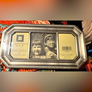 NWT Pewter picture frame. Center 3x3, right and left 2x3. Still shrink wrapped.